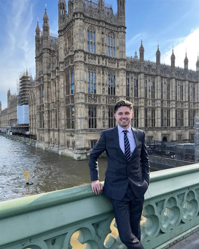 Simon Crowther outside the Houses of Parliament